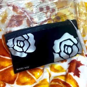 A beautiful black velvet cosmetic bag “Mary Kay “ good condition,clean new